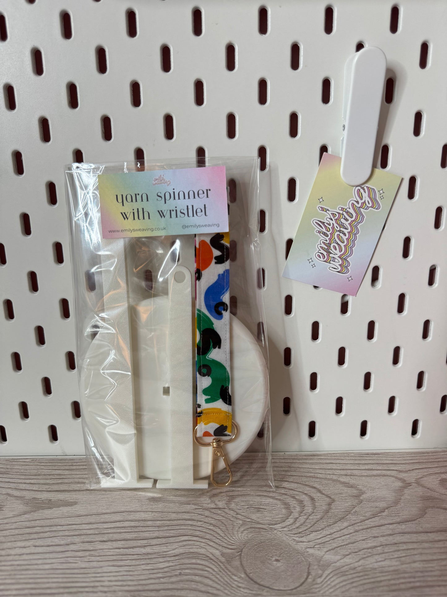 White Yarn Spinner with Abstract Wristlet