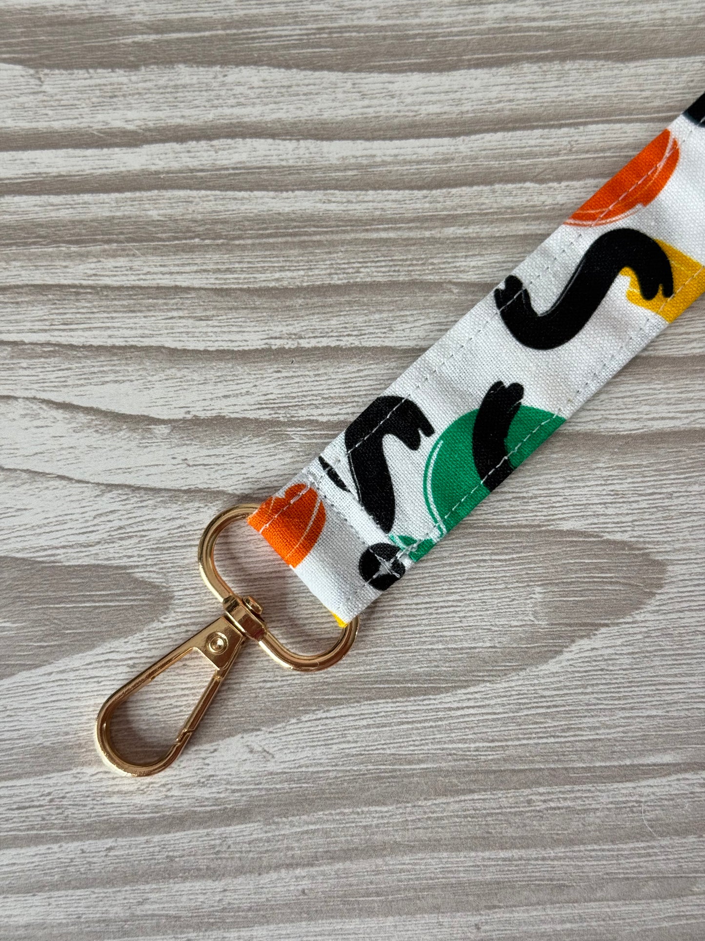 White Yarn Spinner with Abstract Wristlet