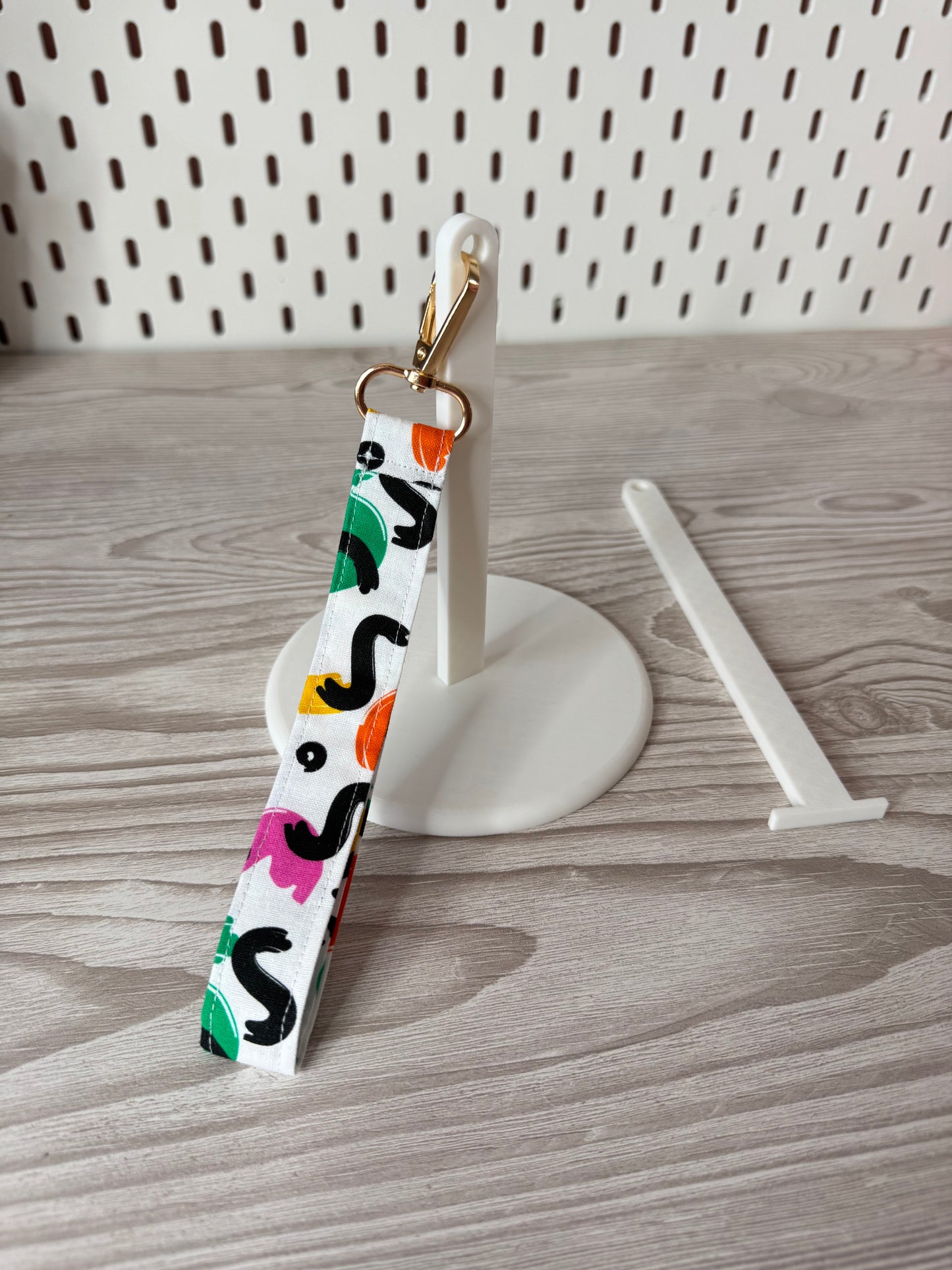 White Yarn Spinner with Abstract Wristlet