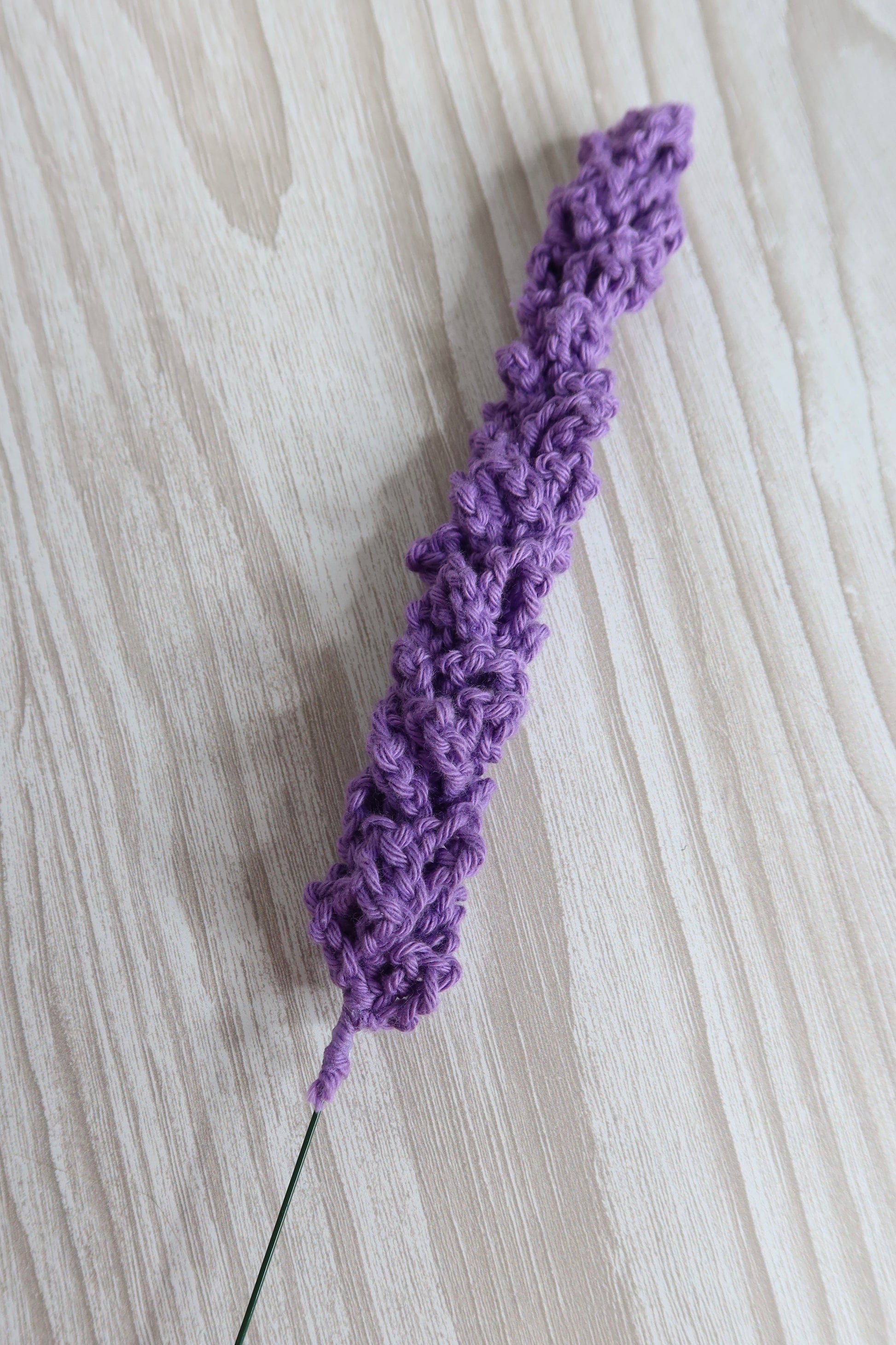 A single crochet lavender stem in Deep Purple